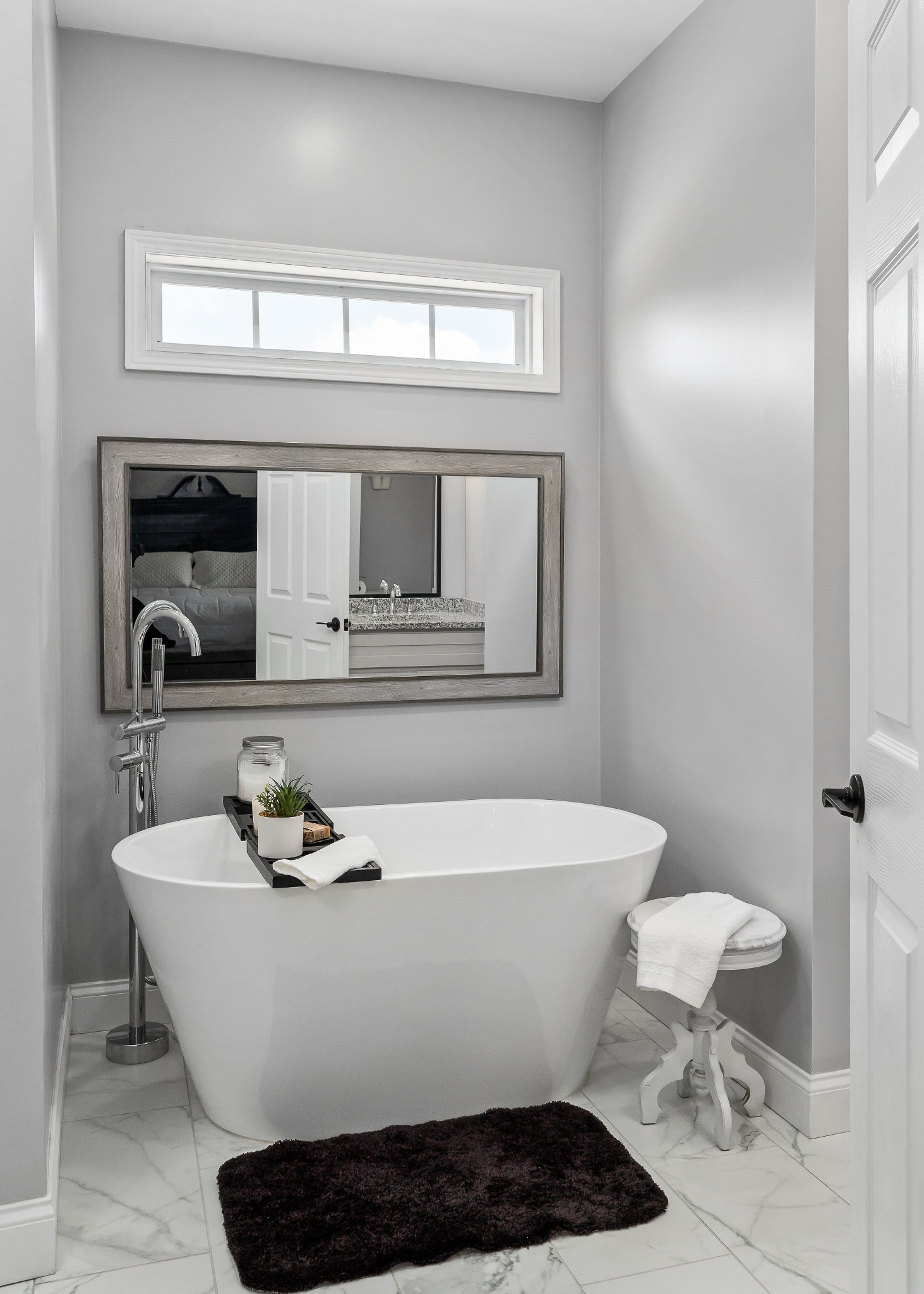 1042 North Spring Street Sparta, TN 38583 - Photo 23 of 36 a white bath tub sitting next to a white toilet