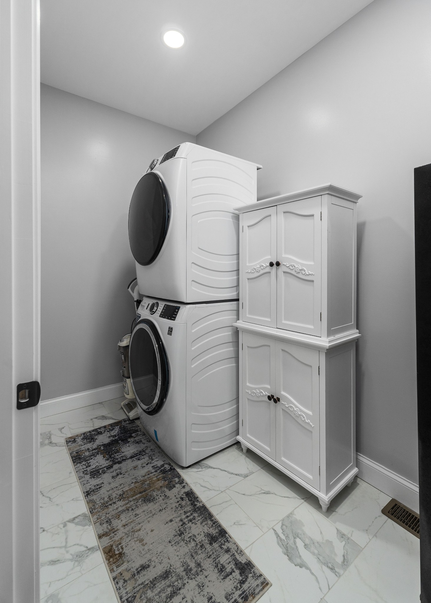 1042 North Spring Street Sparta, TN 38583 - Photo 30 of 36 a utility room with cabinets