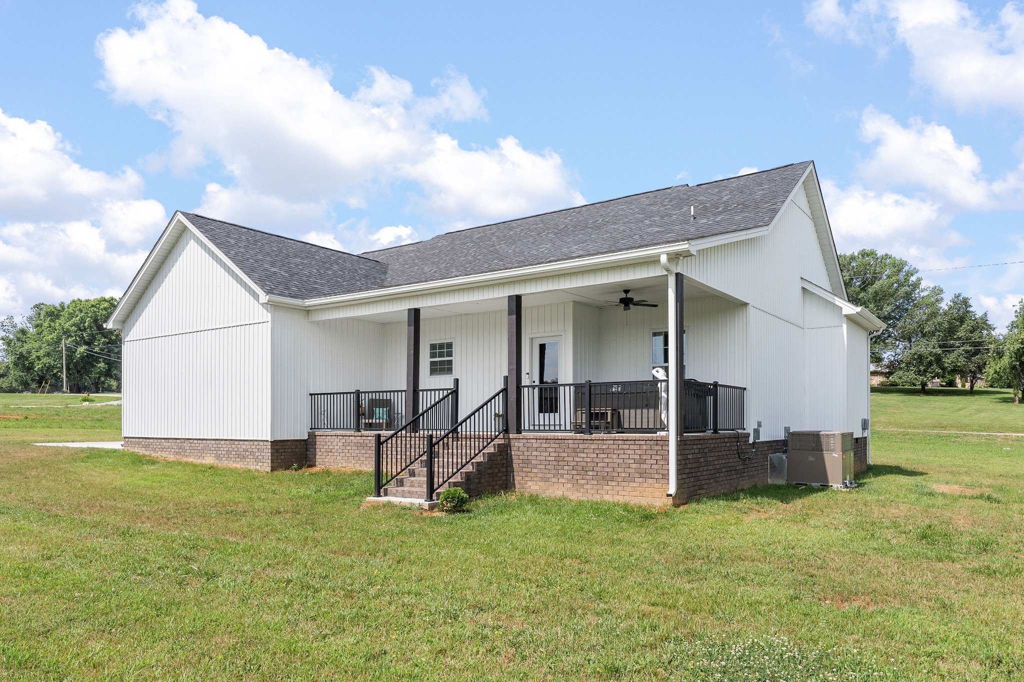 1042 North Spring Street Sparta, TN 38583 - Photo 8 of 36 a view of a house with backyard and porch