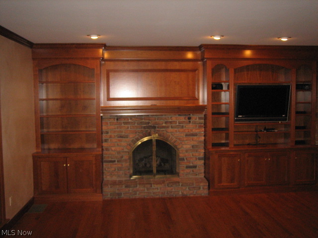 2323 Lancaster Road Akron, OH 44313 - Photo 6 of 24 This is part of the gorgeous family rm. w/gas fireplace and TV that stays.