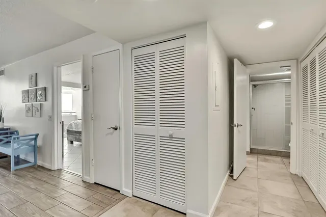 a view of a room with windows