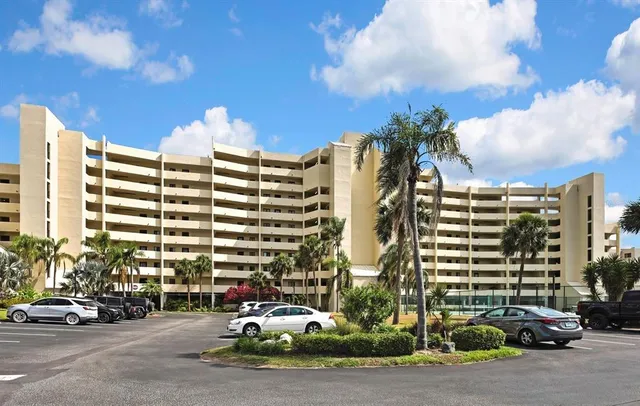 a city street lined with buildings and cars
