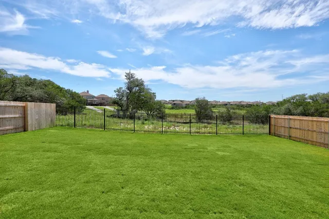 a view of an outdoor space and a yard