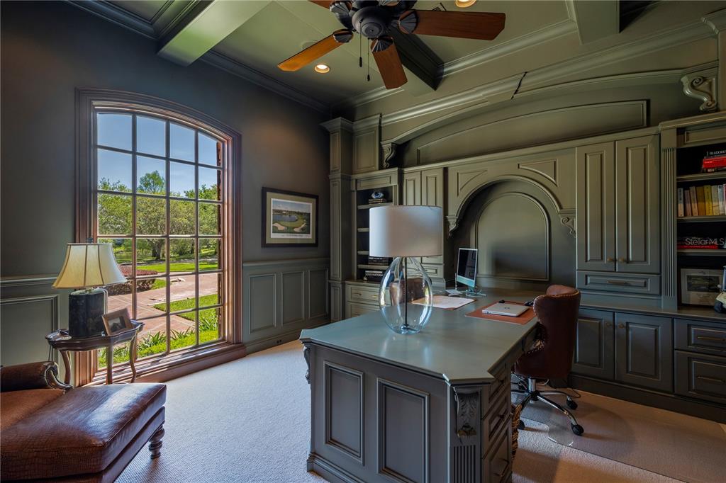 9121 Tibet Pointe Circle Windermere, FL 34786 - Photo 15 of 100 a kitchen with a table chairs and a chandelier
