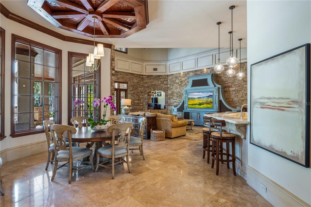 9121 Tibet Pointe Circle Windermere, FL 34786 - Photo 19 of 100 a view of a dining room with furniture window and outside view