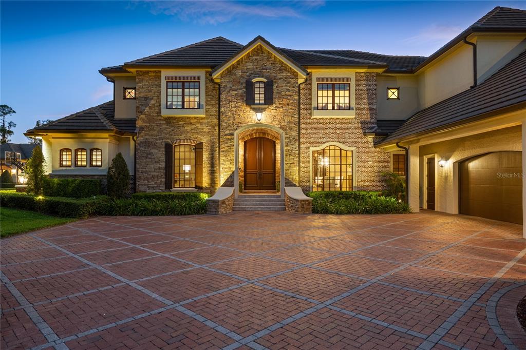 9121 Tibet Pointe Circle Windermere, FL 34786 - Photo 3 of 100 a front view of a house