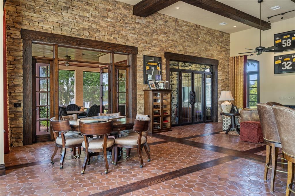 9121 Tibet Pointe Circle Windermere, FL 34786 - Photo 33 of 100 a view of a dining room with furniture window and outside view
