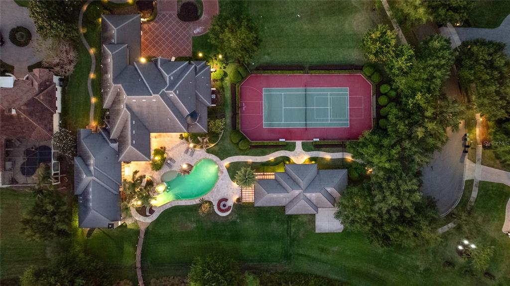 9121 Tibet Pointe Circle Windermere, FL 34786 - Photo 5 of 100 an aerial view of a house