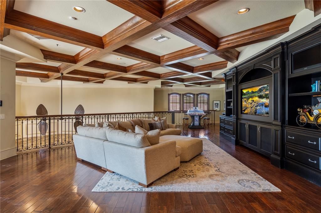 9121 Tibet Pointe Circle Windermere, FL 34786 - Photo 52 of 100 a living room with furniture and a flat screen tv