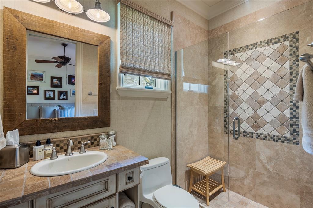9121 Tibet Pointe Circle Windermere, FL 34786 - Photo 59 of 100 a bathroom with a sink toilet and shower