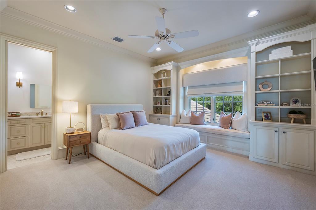 9121 Tibet Pointe Circle Windermere, FL 34786 - Photo 60 of 100 a spacious bedroom with a large bed and a large window