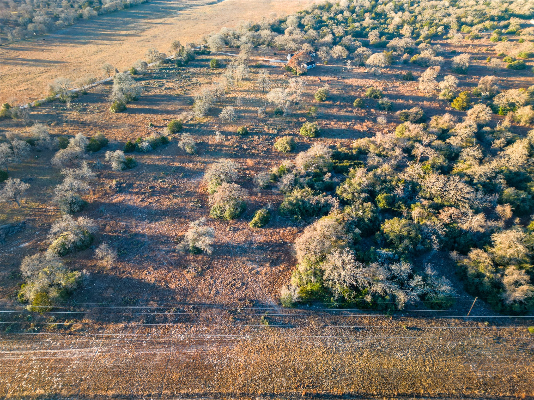 0 Sandy Pine Road Luling, TX 78648 - Photo 11 of 27 an aerial view of residential houses with outdoor space