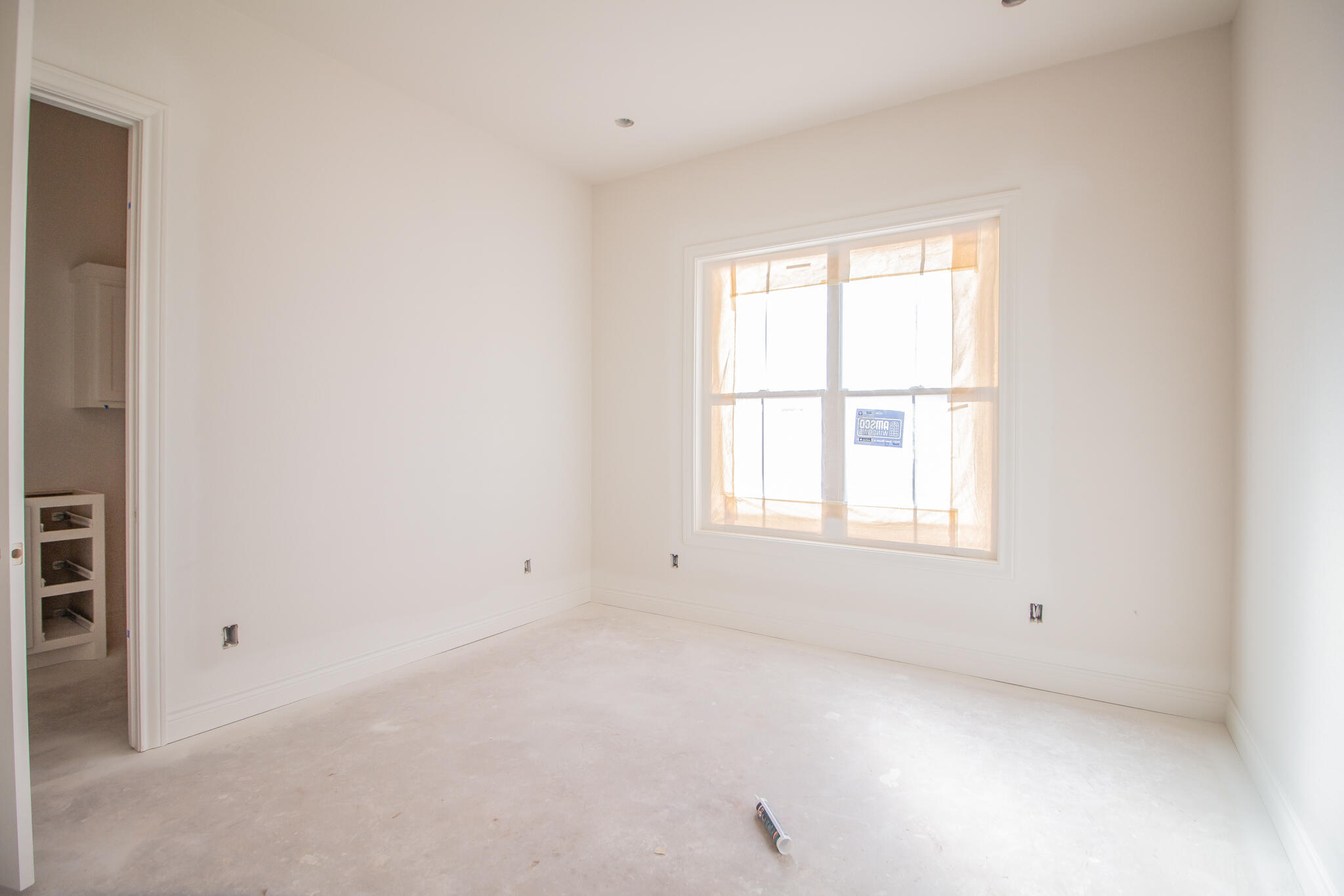 3116 County Road 7660 Lubbock, TX 79423 - Photo 15 of 15 an empty room with a window