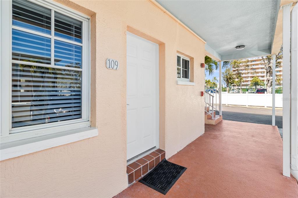19417 Gulf Boulevard, Unit C109 Indian Rocks Beach, FL 33785 - Photo 3 of 48 a view of livingroom with hardwood floor and window