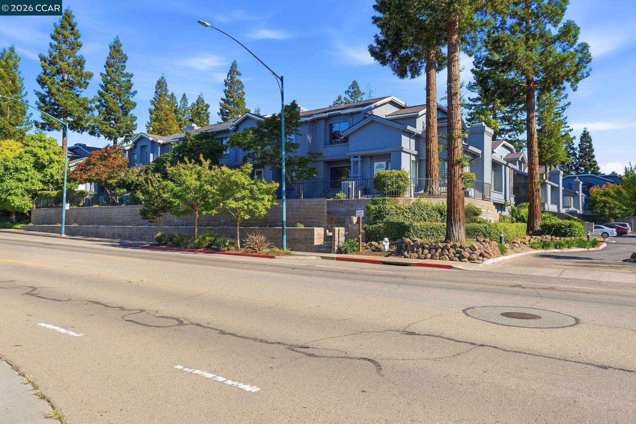 1707 Geary Road Walnut Creek, CA 94597 - Photo 42 of 43 front view of a house with a street