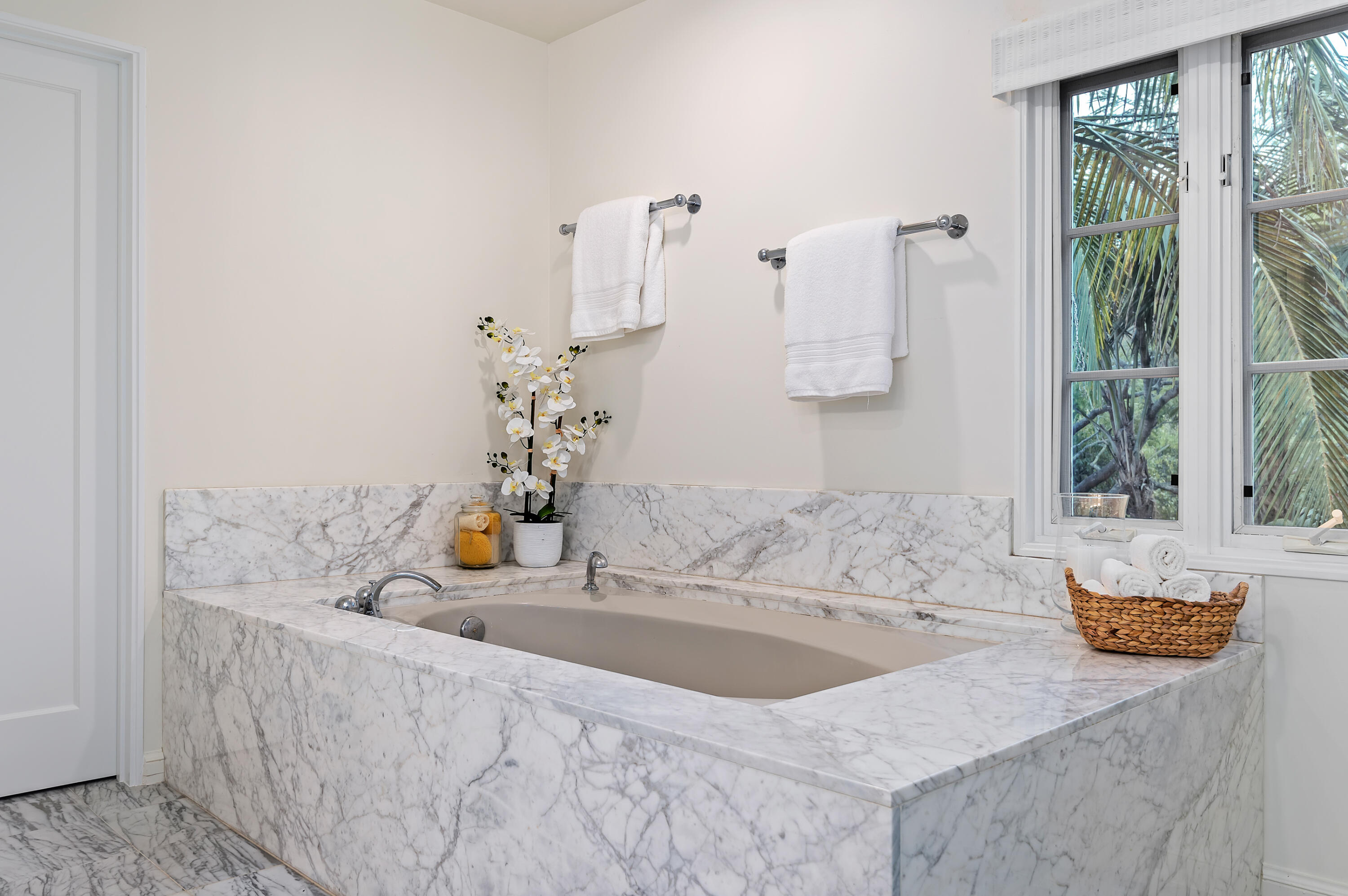 189 Hermosillo Road Montecito, CA 93108 - Photo 29 of 47 a bathroom with a granite countertop sink and a window