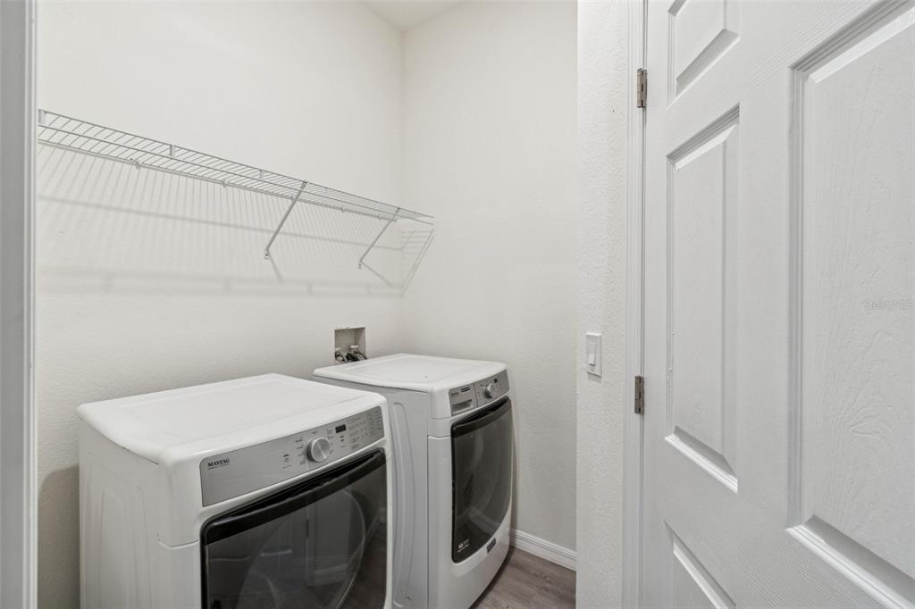 119 Winchester Lane Haines City, FL 33844 - Photo 21 of 24 a utility room with dryer and washer