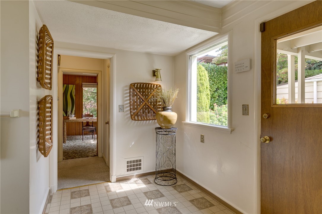 2602 29th Avenue West Seattle, WA 98199 - Photo 13 of 40 a view of entryway with window and hallway