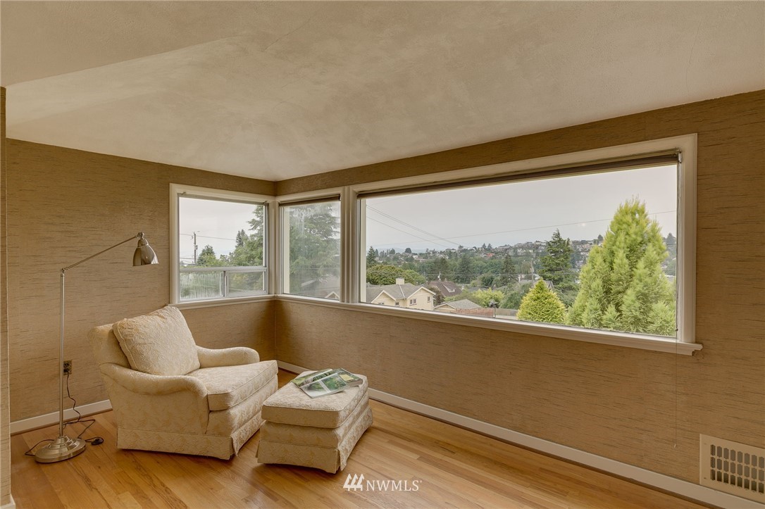 2602 29th Avenue West Seattle, WA 98199 - Photo 20 of 40 a living room with furniture and a large window
