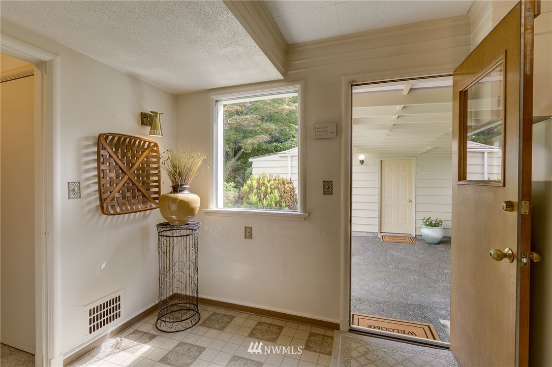 2602 29th Avenue West Seattle, WA 98199 - Photo 27 of 40 wooden floor and window in a room