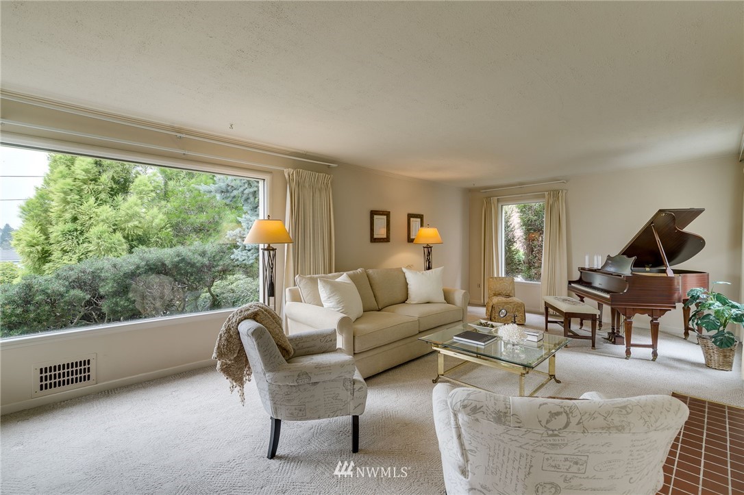 2602 29th Avenue West Seattle, WA 98199 - Photo 5 of 40 a living room with furniture and a window