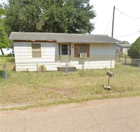 a front view of a house with swimming pool