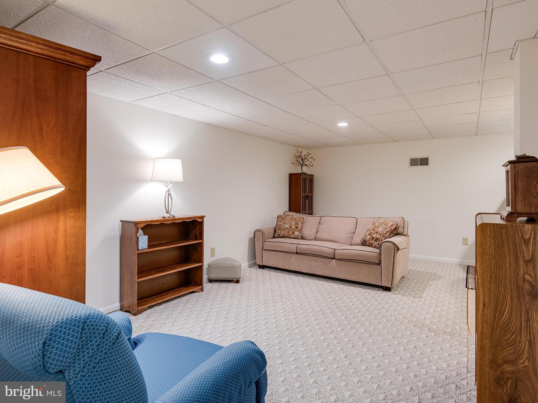 116 Cedar Knoll Road Coatesville, PA 19320 - Photo 23 of 35 Lower level Tv/Snack area