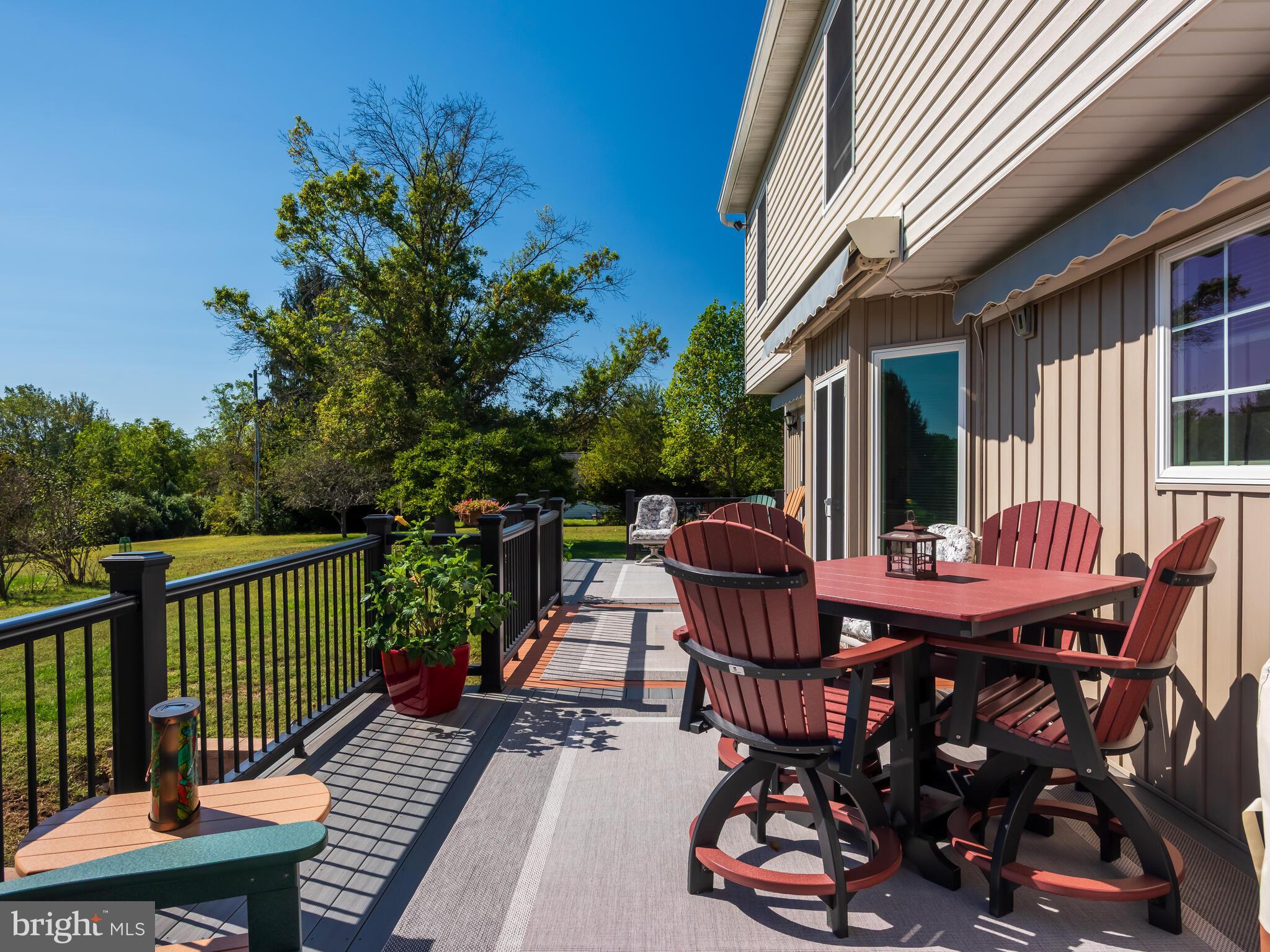116 Cedar Knoll Road Coatesville, PA 19320 - Photo 31 of 35 Decking area with sun setter awning above