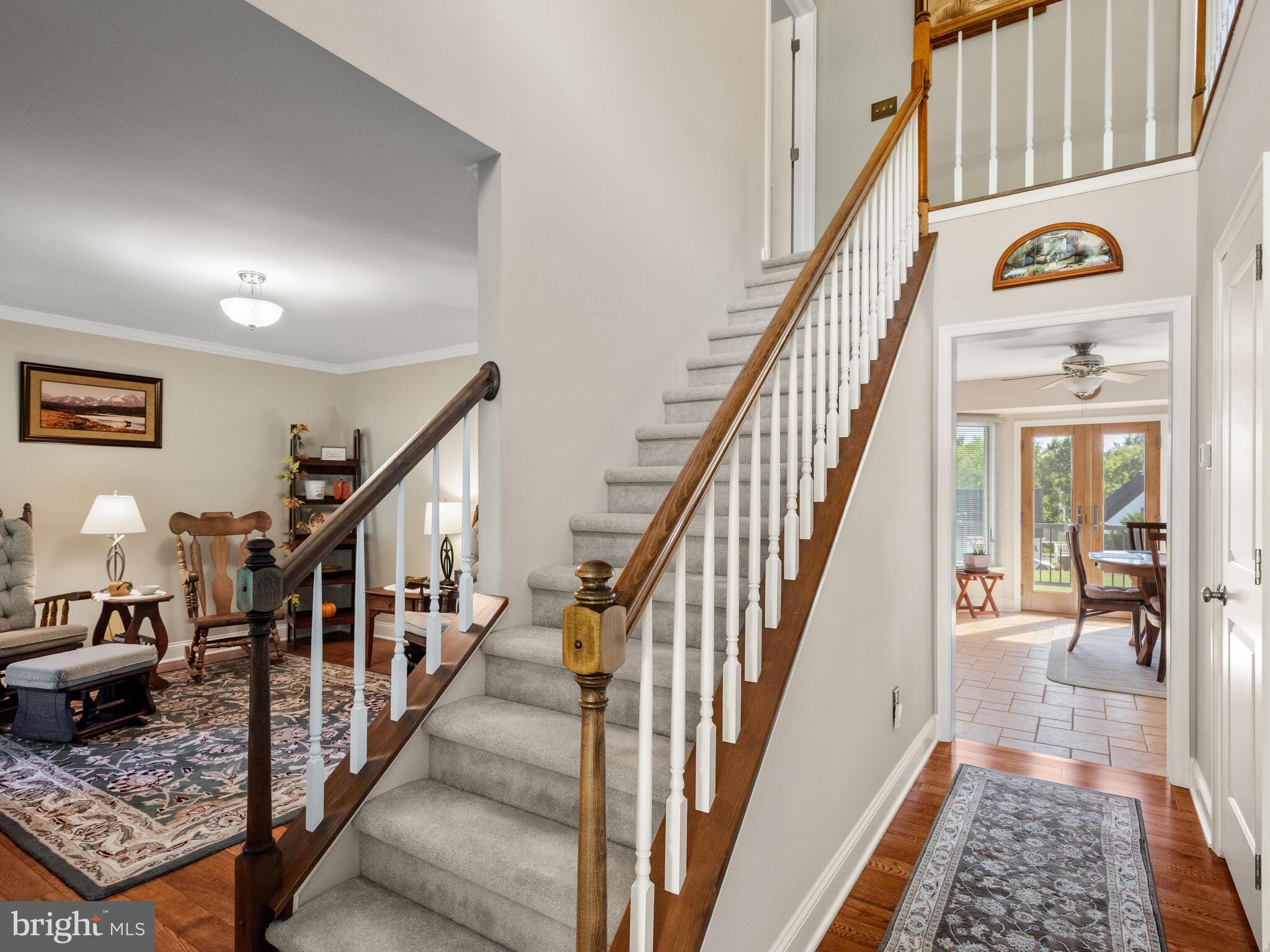 Striking two story open Entry Foyer
