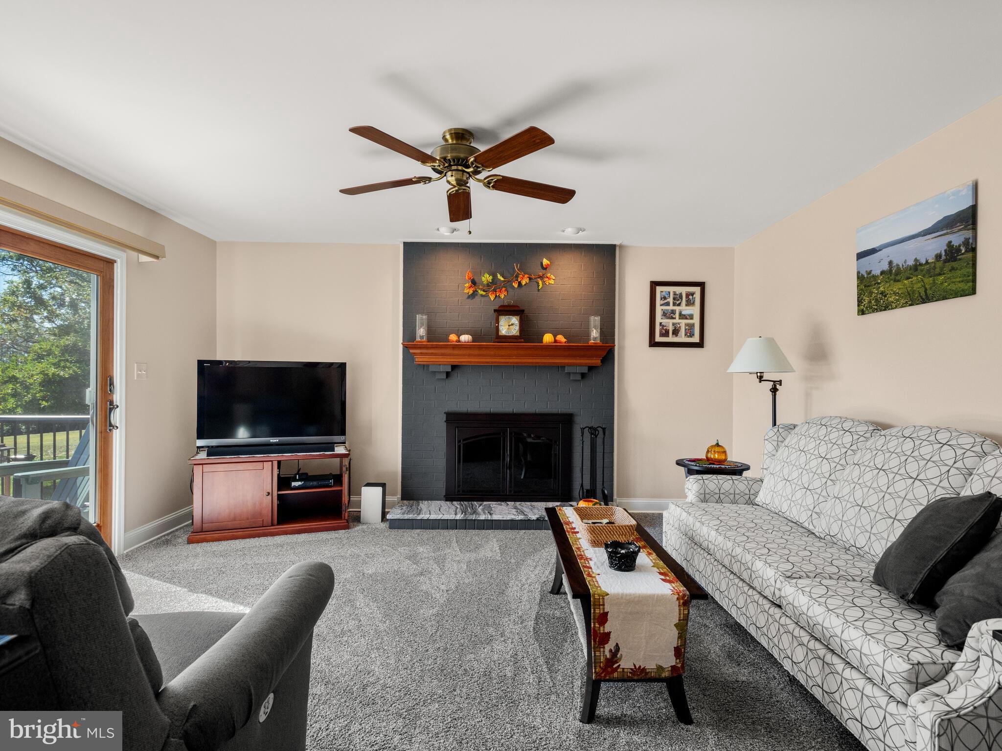 116 Cedar Knoll Road Coatesville, PA 19320 - Photo 8 of 35 Family Room w/ wood burning fireplace. rear access