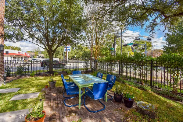 a view of a yard with a patio