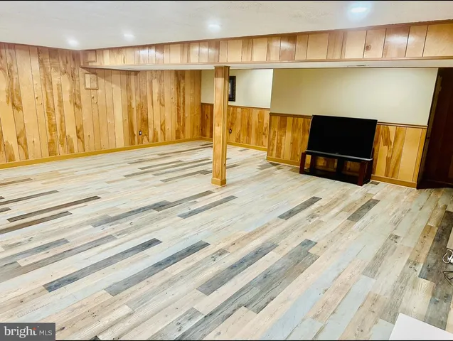 a living room with a couch and a table