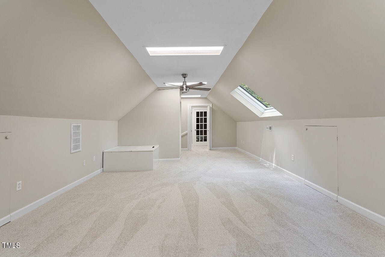 5200 Smallwood Court Raleigh, NC 27613 - Photo 28 of 38 a view of a big room with closet and windows
