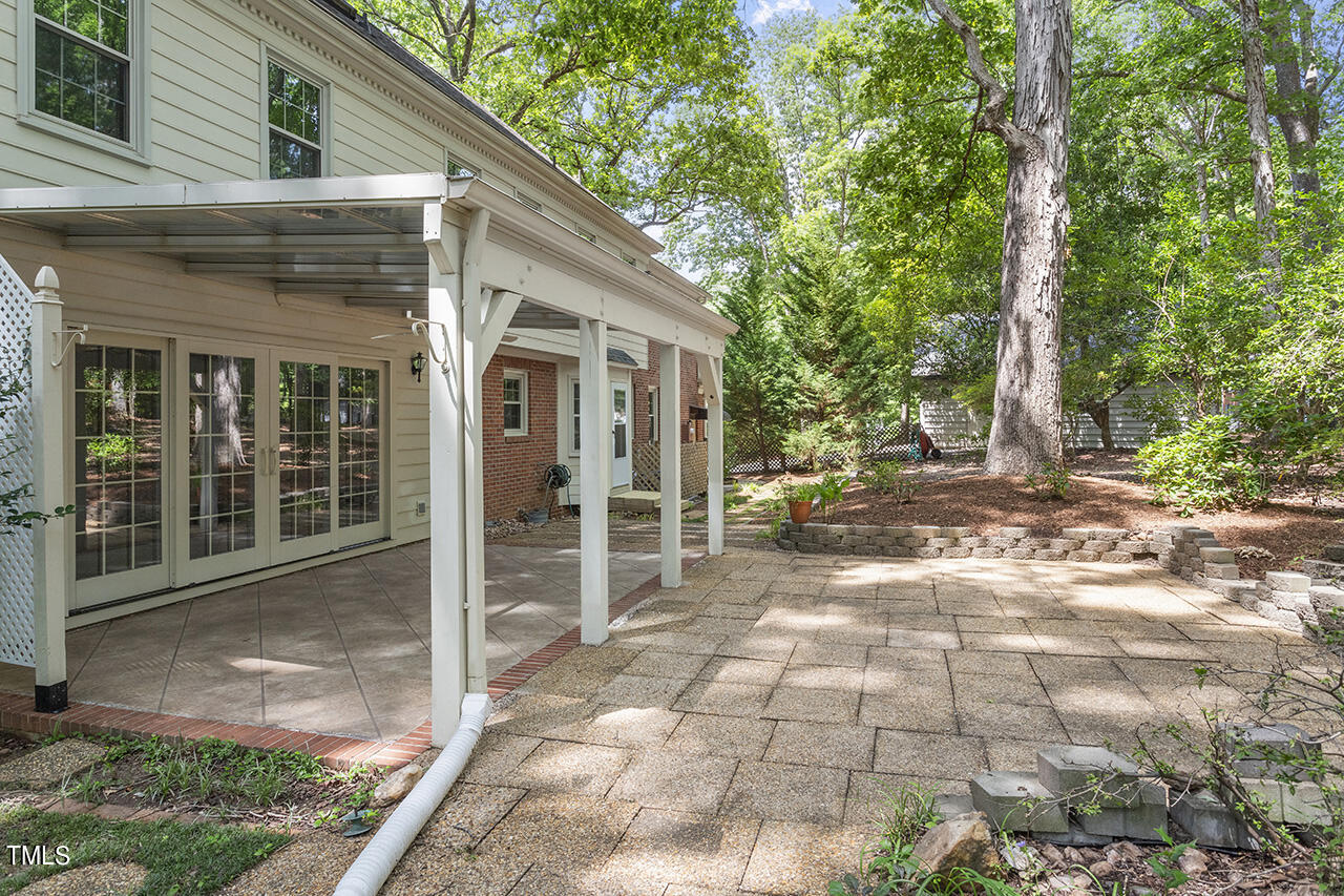 5200 Smallwood Court Raleigh, NC 27613 - Photo 30 of 38 a view of a house with backyard