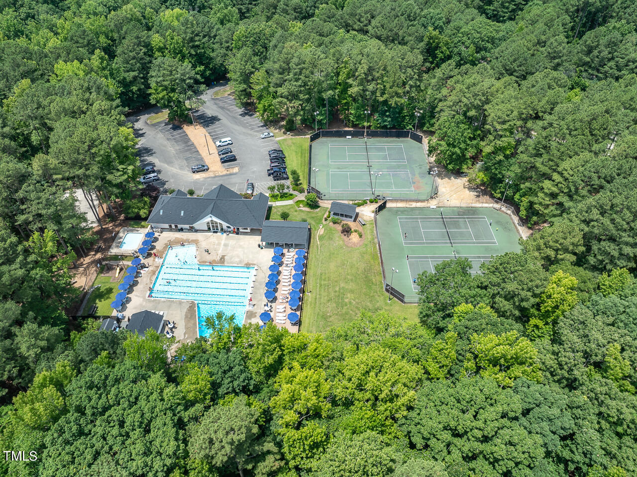 5200 Smallwood Court Raleigh, NC 27613 - Photo 35 of 38 an aerial view of a house with outdoor space and trees all around