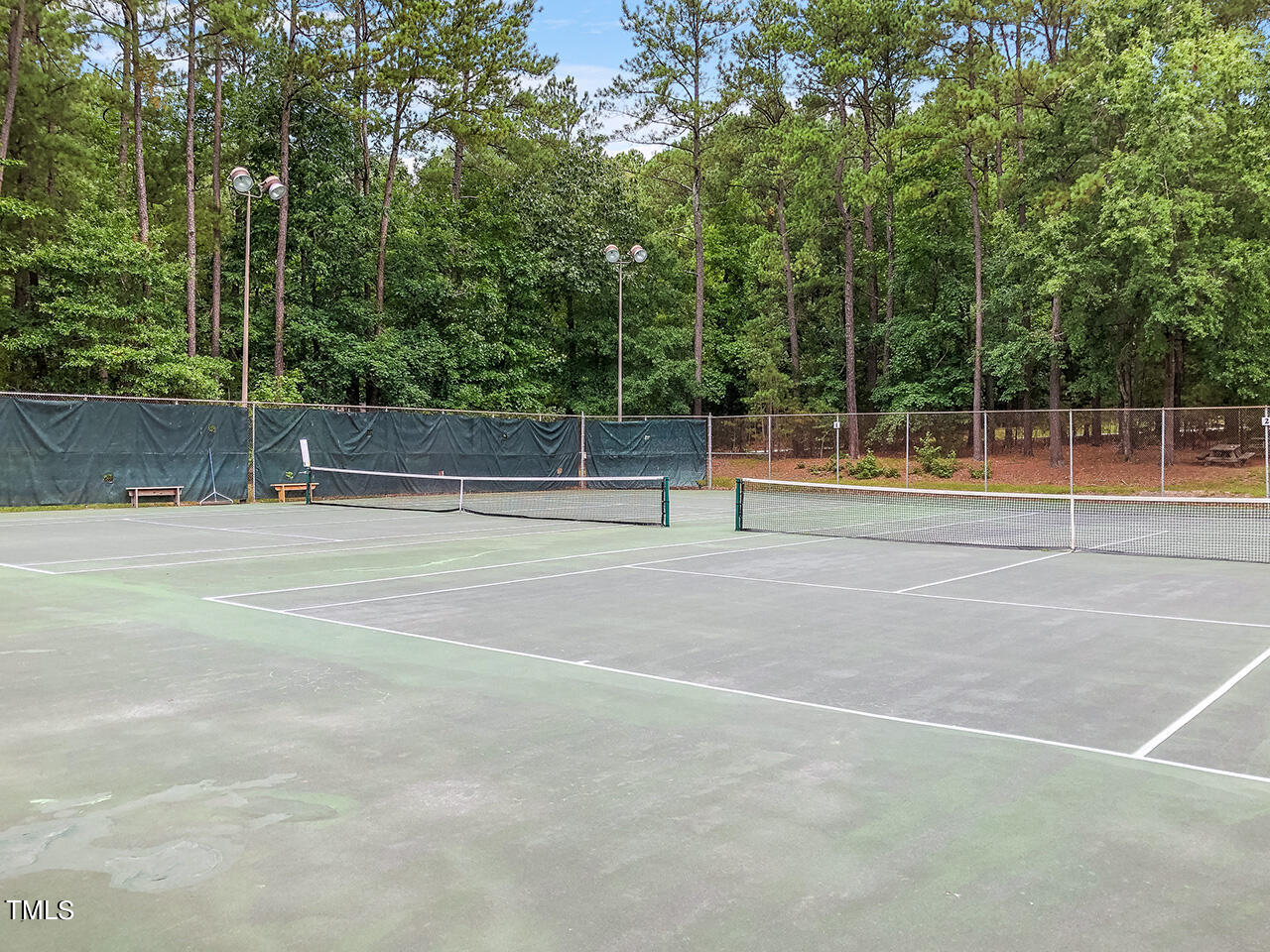 5200 Smallwood Court Raleigh, NC 27613 - Photo 37 of 38 a view of a tennis court