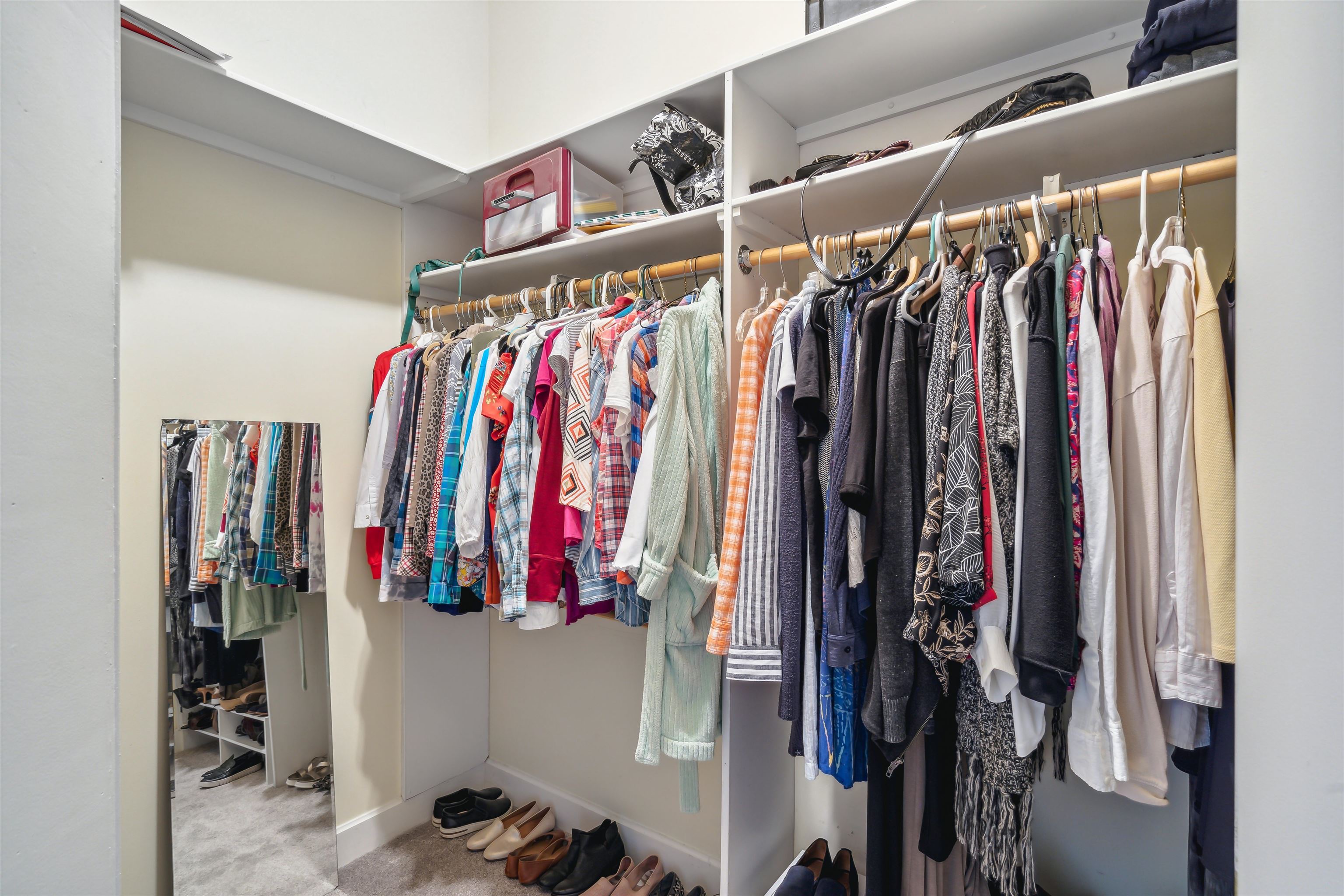 648 Riverside Drive, Unit 320 Memphis, TN 38103 - Photo 21 of 39 Hanging clothes and shoe storage on two walls