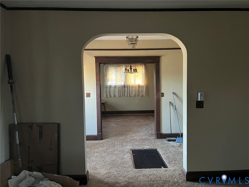 1633 Stuart Avenue Petersburg, VA 23803 - Photo 26 of 28 Hallway with arched walkways and carpet floors