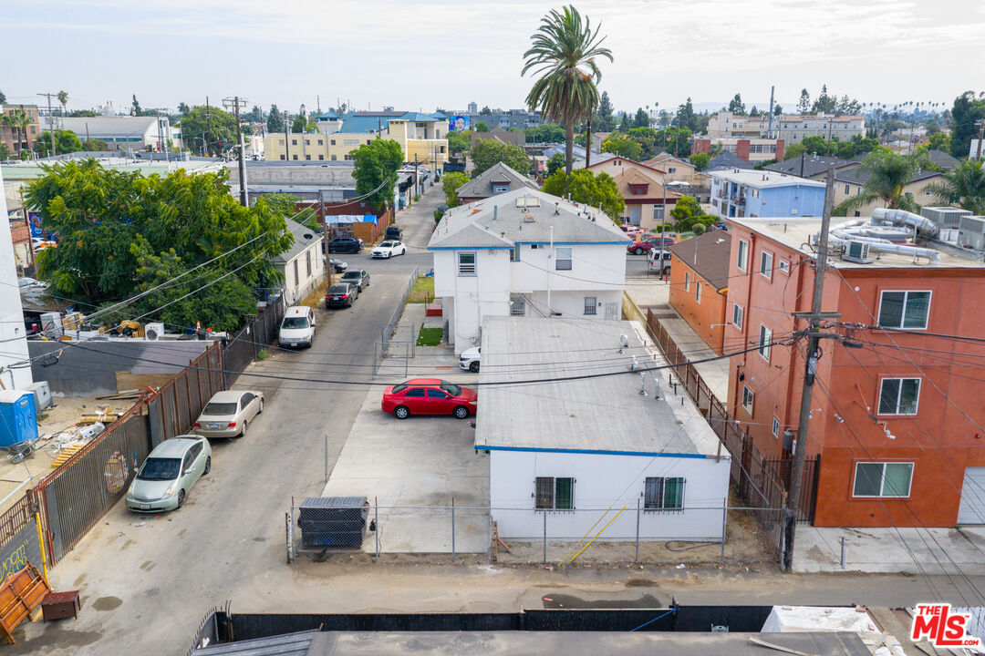 1047 East 33rd Street Los Angeles, CA 90011 - Photo 6 of 24 an aerial view of residential houses with outdoor space