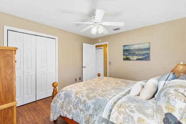 a bathroom with a sink toilet and a mirror