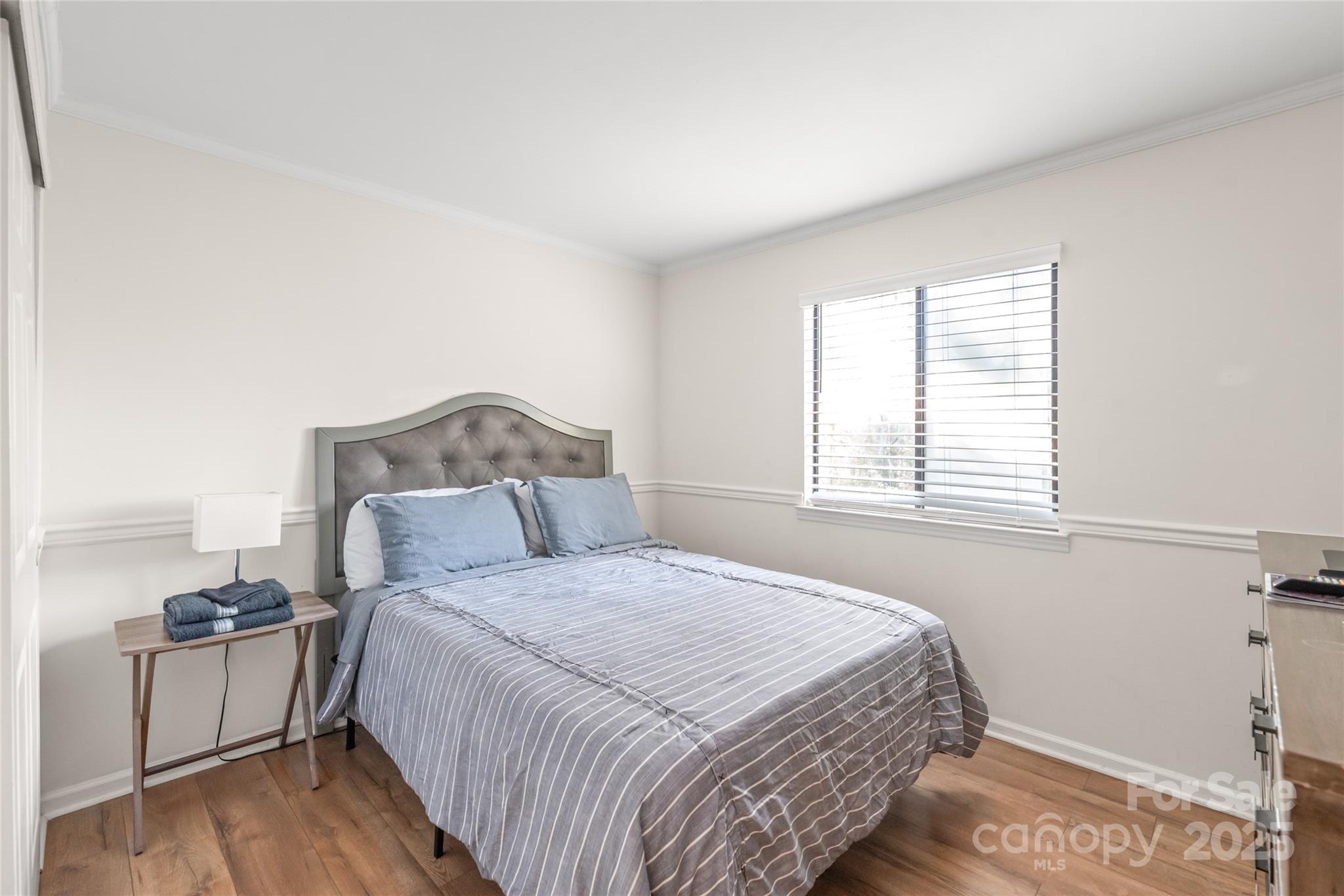 11058 Cedar View Rd. Charlotte, NC 28226 - Photo 21 of 28 a bedroom with a bed and a window