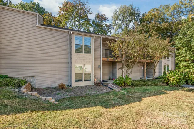 a view of a yard in front of a house