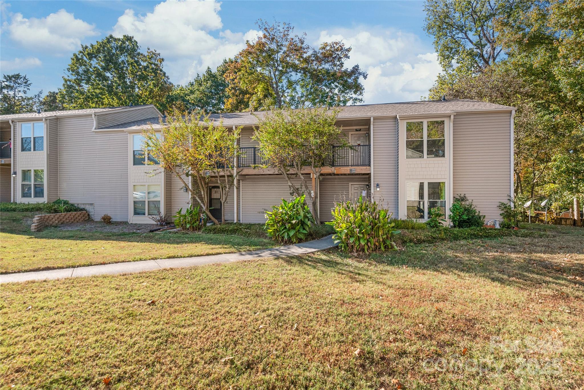 11058 Cedar View Rd. Charlotte, NC 28226 - Photo 3 of 28 a view of a house with backyard and tree