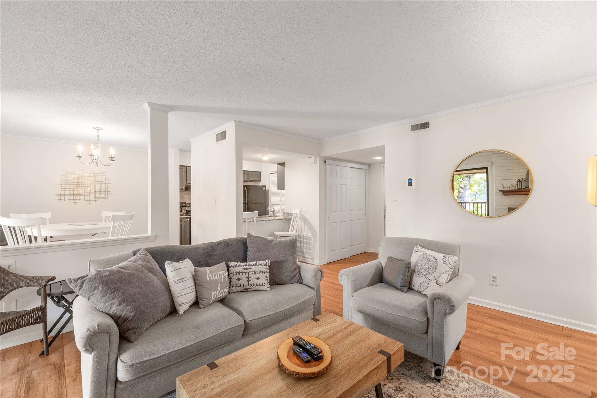 11058 Cedar View Rd. Charlotte, NC 28226 - Photo 5 of 28 a living room with furniture and a large window