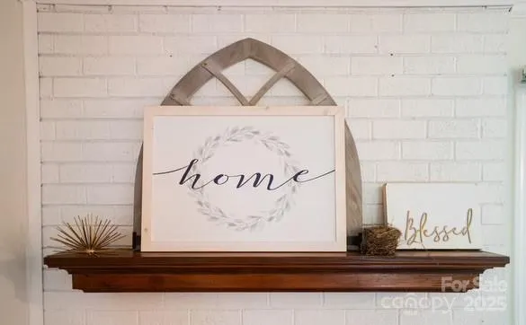 a view of wooden door with a bench