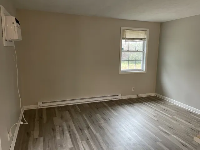a kitchen with stainless steel appliances granite countertop a refrigerator sink and cabinets