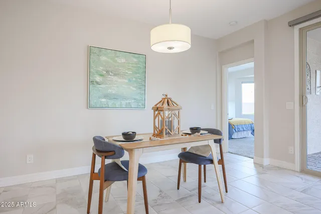 a workspace with furniture and window