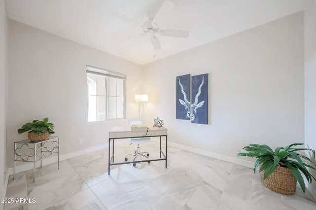 a spacious bathroom with a double vanity sink mirror and shower