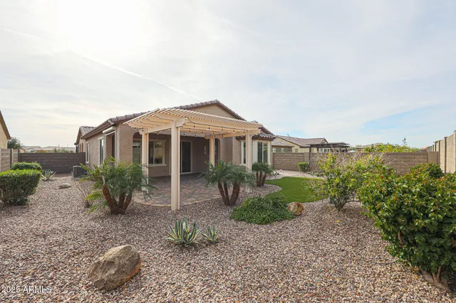 a building exterior with furniture