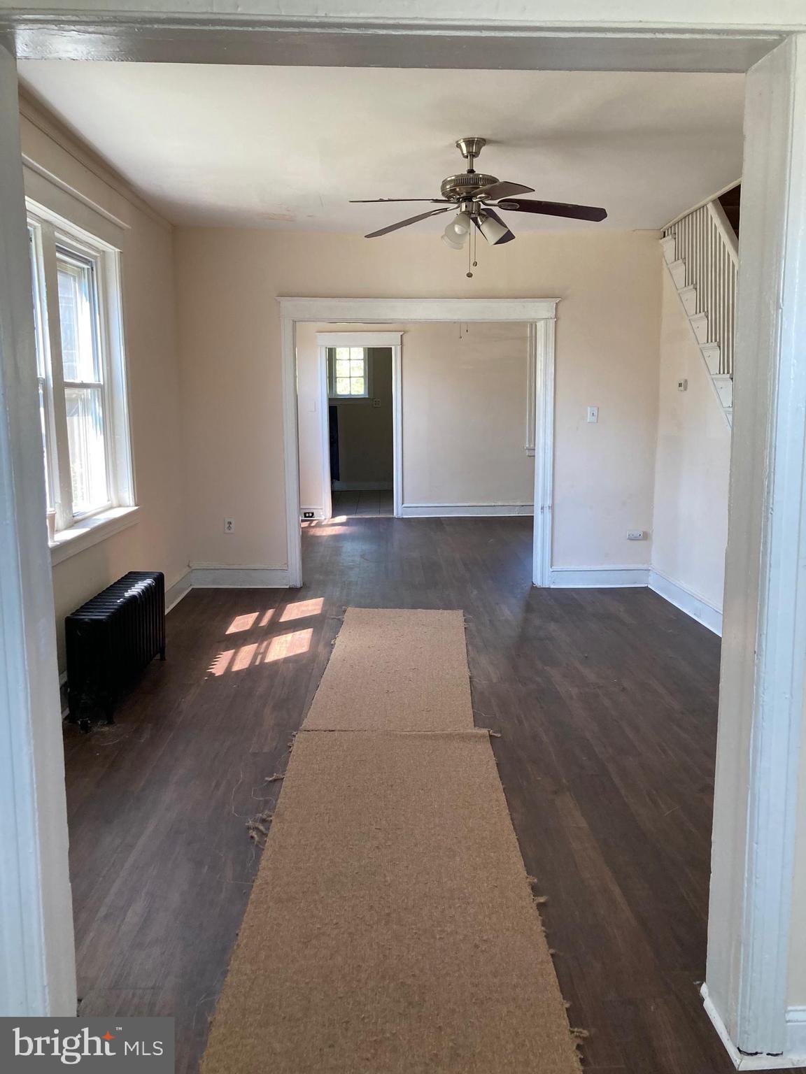 933 Keystone Road Chester, PA 19013 - Photo 3 of 20 View of living room and dining room from porch